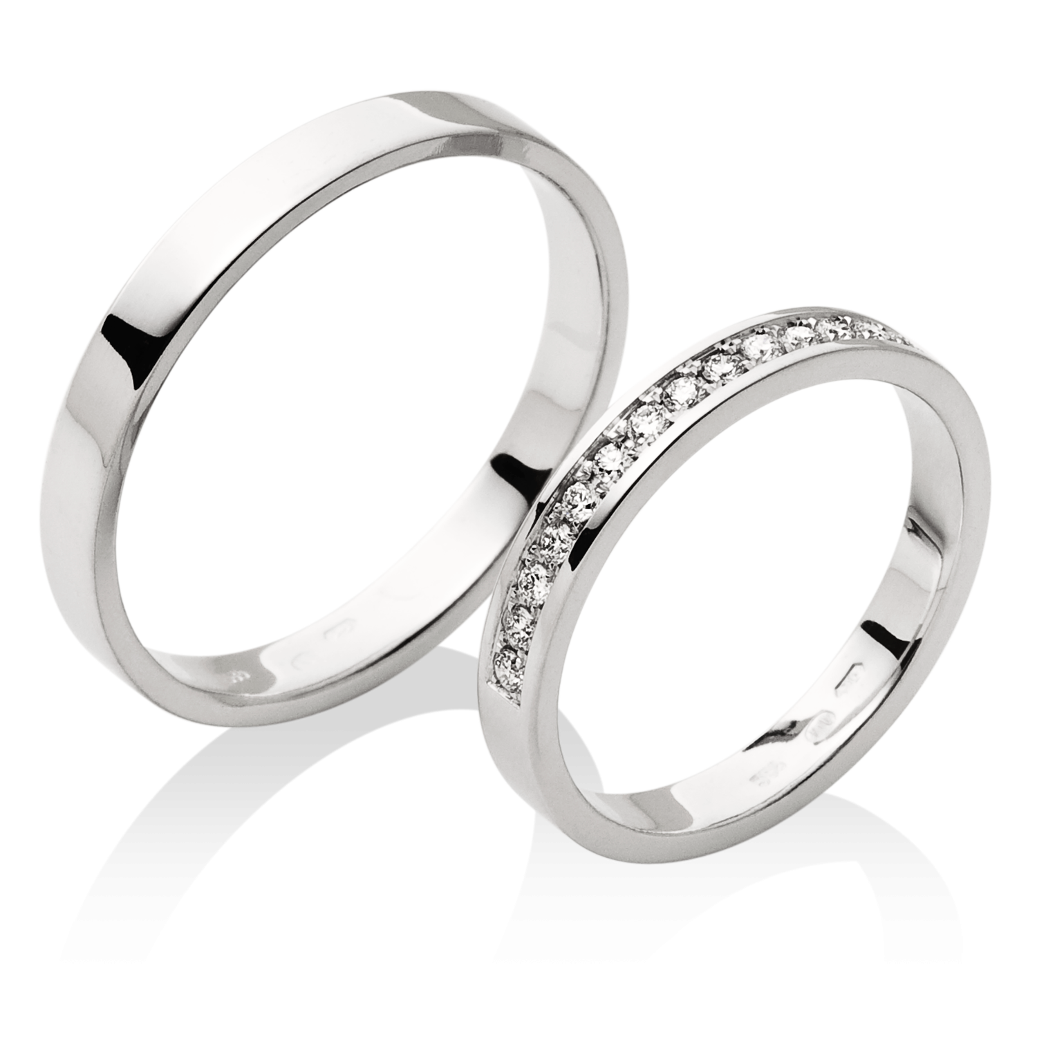 Jemné prsteny s bohatě osázeným dámským prstenem v platině