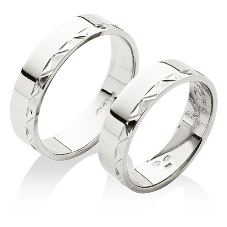 Klasické snubní prsteny s jednoduchou ruční rytinou