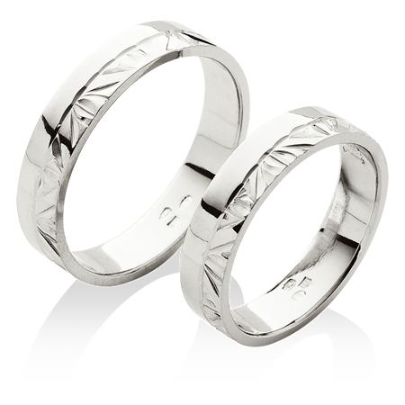 Klasické snubní prsteny s jednoduchou ruční rytinou z patiny