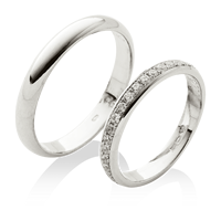 klasické snubní prsteny s dámským prstenem bohatě osázeným kameny